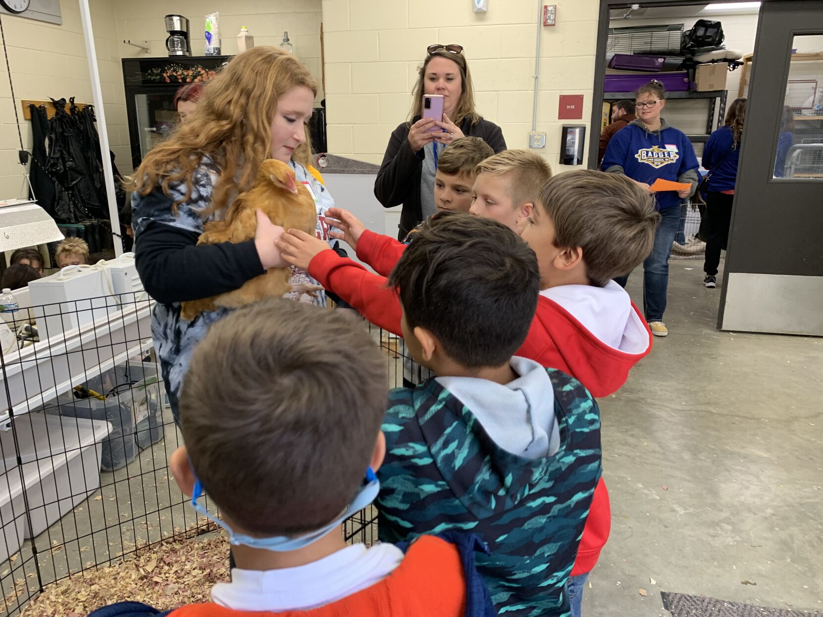 Badger High School agriculture student Ava Stone talks to her third graders about chickens
